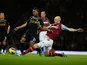 James Collins slides in on Raheem Sterling on December 9, 2012