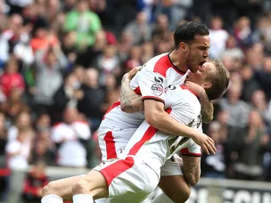 Carruthers hat-trick leads Dons to easy win