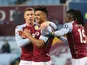 Aston Villa's Ollie Watkins celebrates scoring their first goal with Ross Barkley and Bertrand Traore on January 23, 2021