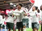 Chelsea's Josh Acheampong celebrates with teammates on October 18, 2025