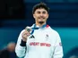 Great Britain's Jake Jarman poses after winning the bronze medal in the men's floor at the Paris Olympic Games on August 3, 2024