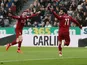 Liverpool's Mohamed Salah celebrates scoring against Newcastle on May 4, 2019