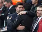 Unai Emery and Mauricio Pochettino embrace on December 2, 2018