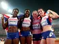 Christine Ohuruogu of Great Britain, Anyika Onuora of Great Britain, Eilidh Child of Great Britain and Seren Bundy-Davies of Great Britain celebrate after winning bronze in the Women's 4x400 Relay Final during day nine of the 15th IAAF World Athletics Cha
