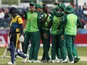 South Africa's Kagiso Rabada celebrates taking the wicket of Sri Lanka's Dimuth Karunaratne with team mates on June 28, 2019