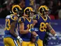 Los Angeles Rams wide receiver Cooper Kupp (18) celebrates with tight end Tyler Higbee (89) and receiver Josh Reynolds (83) after scoring on a 65-yard touchdown reception in the second quarter against the Cincinnati Bengals during an NFL International Ser