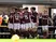 Northampton Town celebrate scoring vs Wimbledon