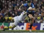 Leinster's Jonathan Sexton gets past Clermont Auvergne's Morgan Parra on December 15, 2012