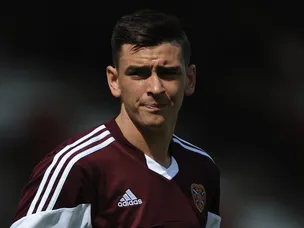 Hearts beat 10-man Raith