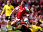 Borussia Dortmund's Filippo Mane (right) challenges Arsenal's Viktor Gyokeres on August 9, 2026