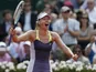 Russia's Maria Sharapova celebrates winning against Serbia's Jelena Jankovic in three sets during their Quarter Final match of the French Open tennis tournament on June 5, 2013