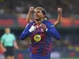 Lamine Yamal celebrates scoring for Barcelona on December 21, 2025