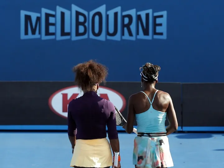 Williams sisters stroll past Voegele, Giorgi