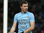 City striker Edin Dzeko sends a message to the fans in the game against Stoke on January 1, 2013