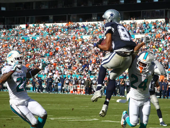 Romo returns to end Cowboys' losing streak