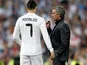 Real Madrid's coach Jose Mourinho talks to Cristiano Ronaldo