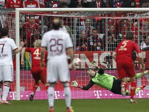 Bayern Munich goalkeeper Tom Starke saves a penalty during the match with FC Nuremberg on April 13, 2013