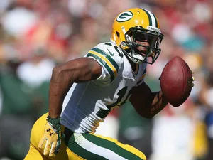 Wide receiver Randall Cobb of the Green Bay Packers carries the ball against the San Francisco 49ers at Candlestick Park on September 8, 2013