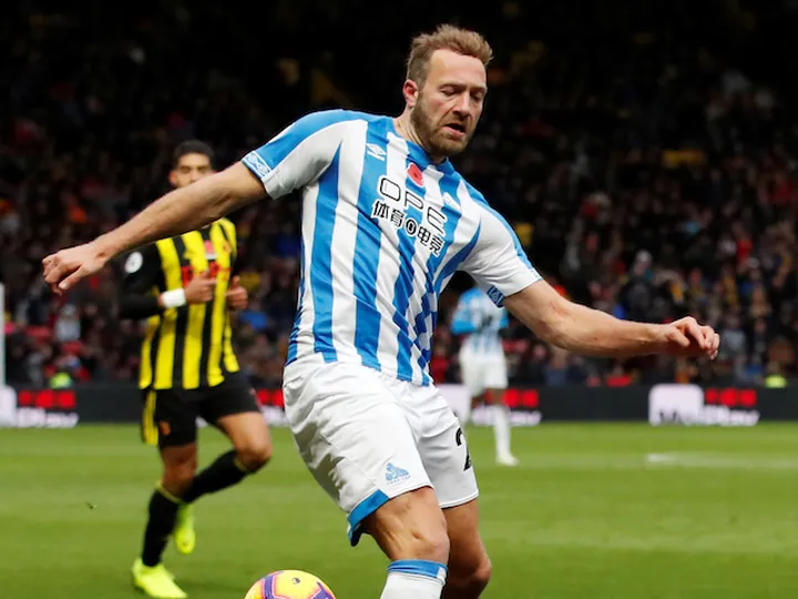Huddersfield striker Laurent Depoitre unhappy with referee Michael Oliver