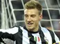 Juve loanee striker Nicklas Bendtner celebrates following a goal by Sebastian Giovinco on December 1, 2012