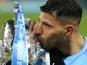 Manchester City striker Sergio Aguero kisses the EFL Cup on February 25, 2018