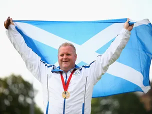Scotland's Burnett wins lawn bowls gold