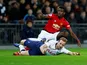 Manchester United midfielder Paul Pogba challenges Tottenham Hotspur striker Harry Kane during their Premier League clash on January 13, 2019