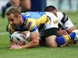Leeds Rhinos' Rob Burrows scores a try against Widnes Vikings on June 17, 2013