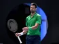 Novak Djokovic looks dejected at the Australian Open on January 28, 2026