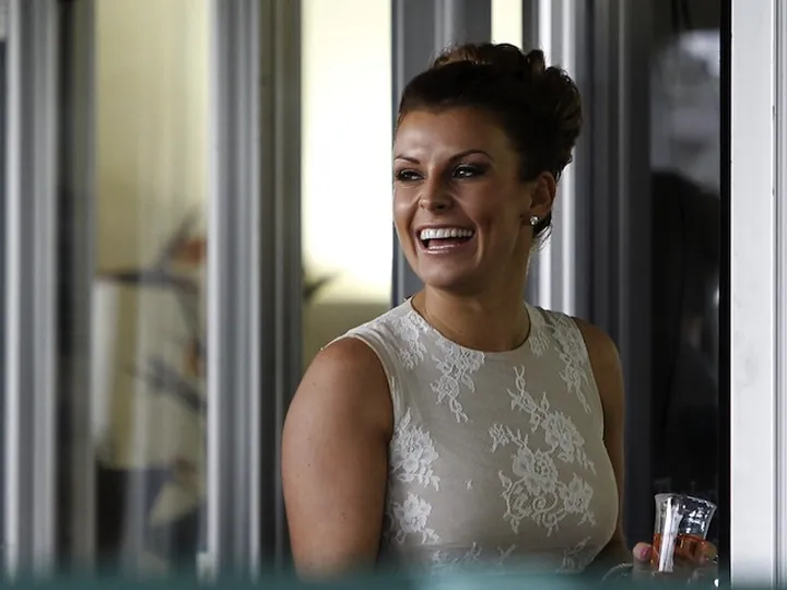 Wayne Rooney's escort apologises