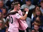 Leicester City's Wilfred Ndidi celebrates scoring their first goal with teammate James Maddison on August 18, 2019