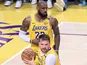  Luka Doncic 77 of the Los Angeles Lakers wins a rebound with LeBron James 23 in the background on February 24, 2025