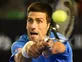 Djokovic sees off Muller to secure quarter-final spot