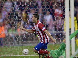 Koke gives Atletico lead