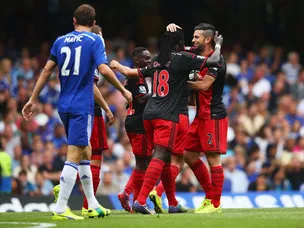 Costa hat-trick downs Swansea 