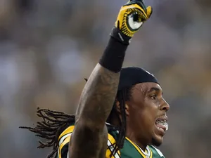 Free safety Morgan Burnett #42 of the Green Bay Packers celebrates a missed field goal by the the New Orleans Saints in the fourth quarter at Lambeau Field on September 30, 2012