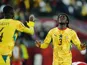 Ghana's Caleb Yirenkyi celebrates with Jonas Adjetey