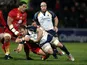 Worcester Warriors' Matt Kvesic is tackled by Perpignan's James Hook on December 6, 2012
