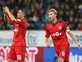 Ghost goal helps Bayer go top
