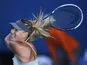Maria Sharapova hits a return during her second round match with Misaki Doi at the Australian Open tennis championship on January 16, 2013