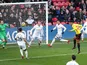 Andre Carrillo scores the opener during the Premier League game between Watford and Swansea City on December 30, 2017