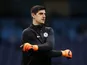 Chelsea goalkeeper Thibaut Courtois warms up prior to a Premier League game in March 2018