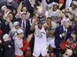 Toronto Raptors forward Kawhi Leonard (2) hoist the Eastern Conference trophy after winning game six of the Eastern conference finals of the 2019 NBA Playoffs against the Milwaukee Bucks at Scotiabank Arena on May 26, 2019