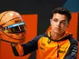 Lando Norris shows off his helmet on May 5, 2022