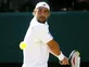 Baghdatis fights off Raonic in second round