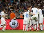 Italy's Leonardo Bonucci celebrates scoring their third goal with teammates against Greece on June 8, 2019