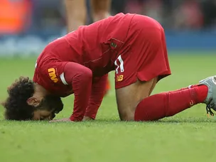 Liverpool survive Watford scare to move 11 points clear