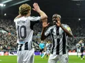 Anthony Gordon and Yoane Wissa of Newcastle United celebrate on January 21, 2026