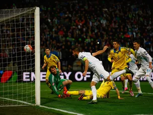 Ukraine survive scare to qualify