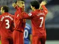 Liverpool's Luis Suarez celebrates scoring his first goal against Wigan on March 2, 2012